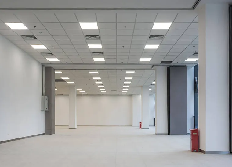 Commercial electrical service work inside a business facility.
